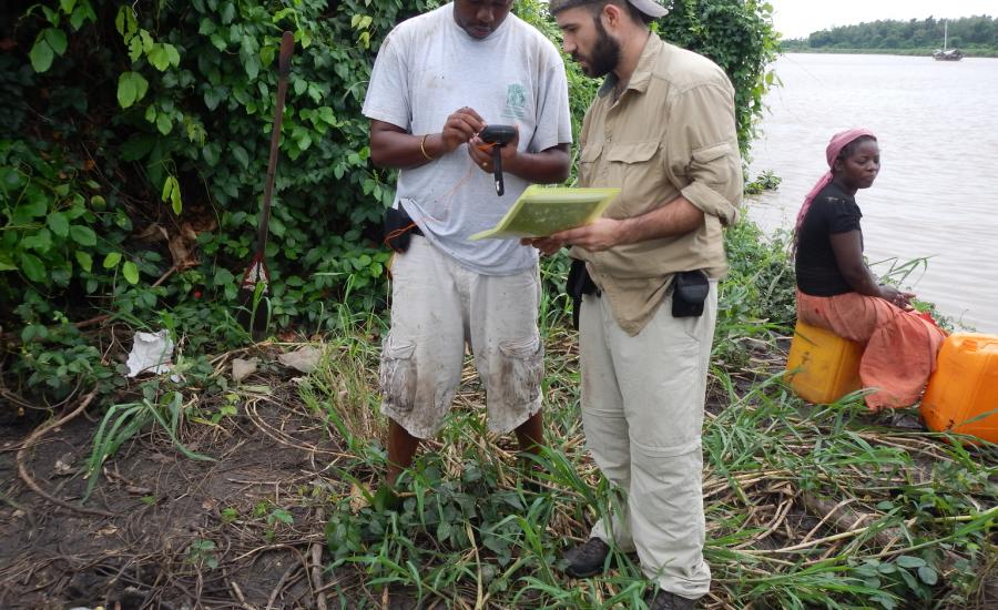 Reading the GPS to record the area's land cover/land use. Left to right: Elianaci (Ph.D. student - University of Dar Es Salaam) and David Lagomasino (NASA/GSFC)